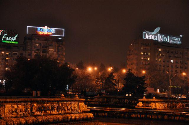 Roof DentalMed Unirea Square at Night